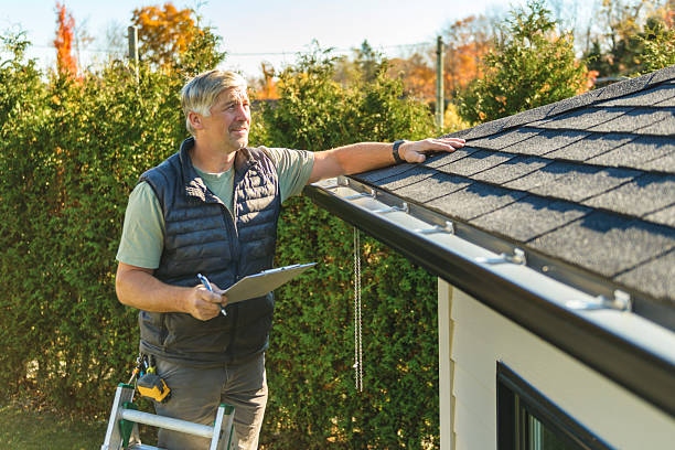 Professional Roof Replacement technician working in Arthur, ND
